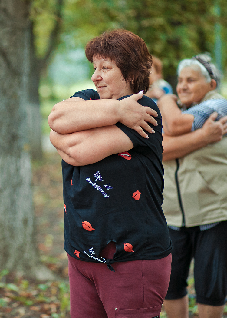 a woman with a necklace and headdress on