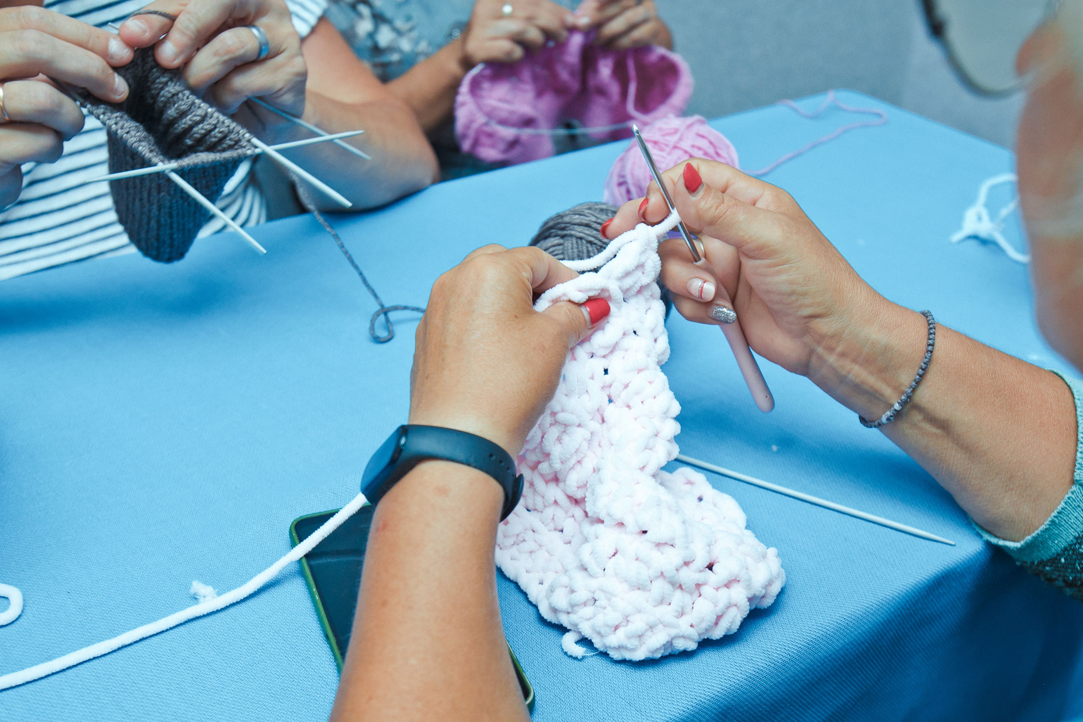two people standing on top of hill