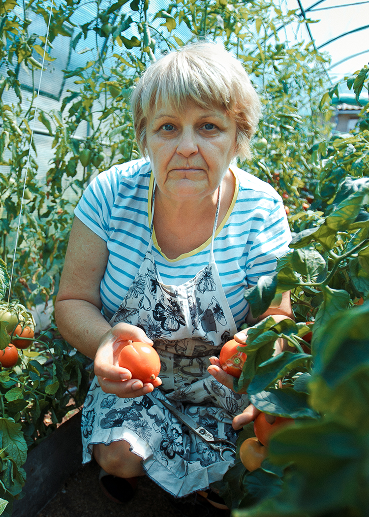 a man with a mask and horns on his head