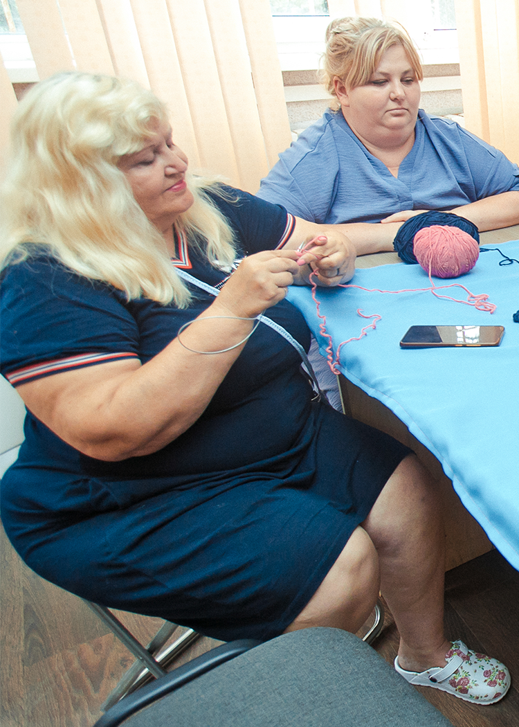 a man with a mask and horns on his head