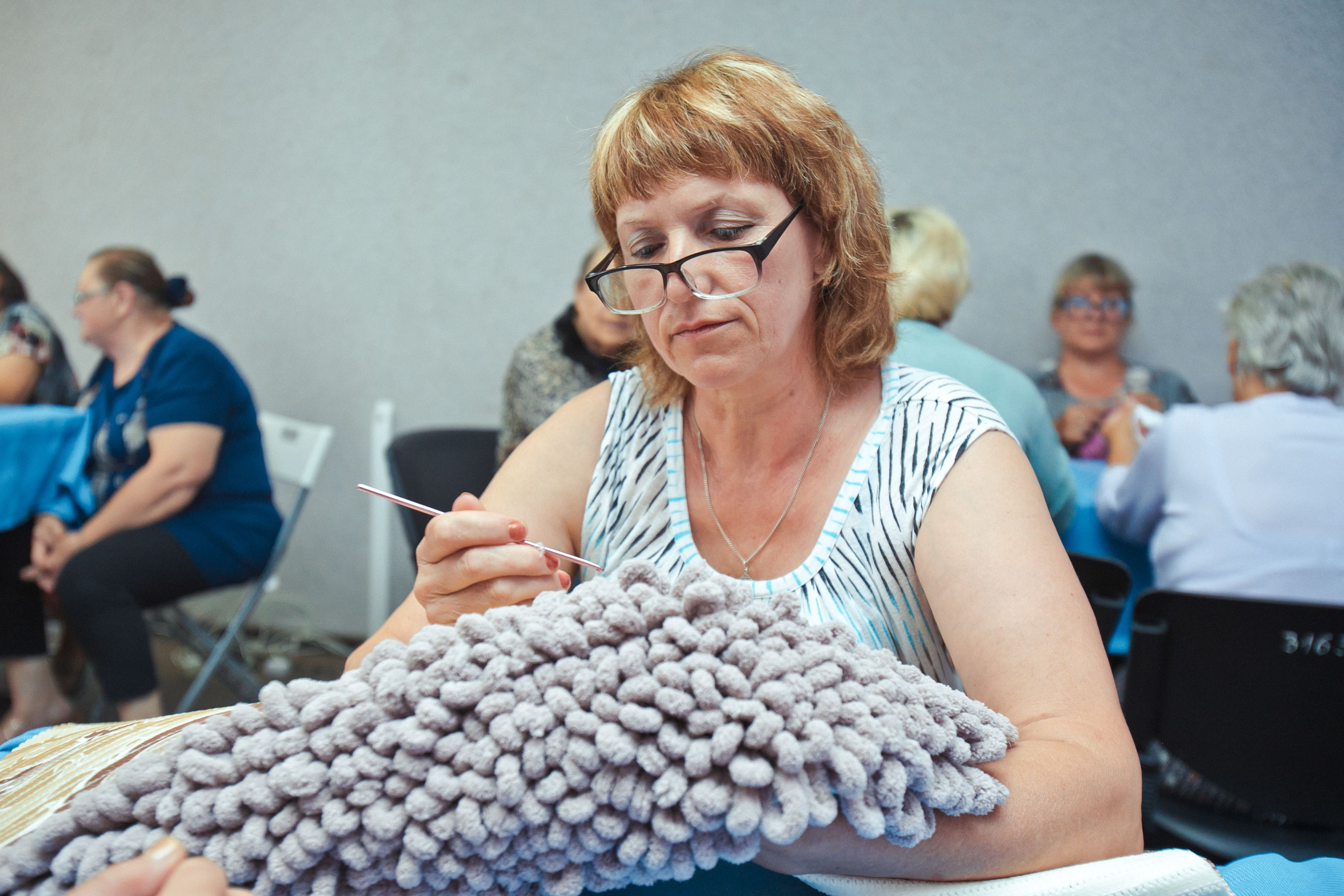 walking camels in line during daytime