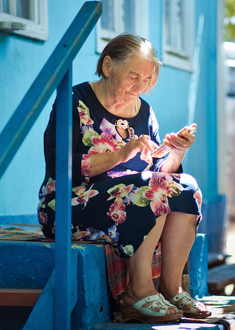 a man with a mask and horns on his head