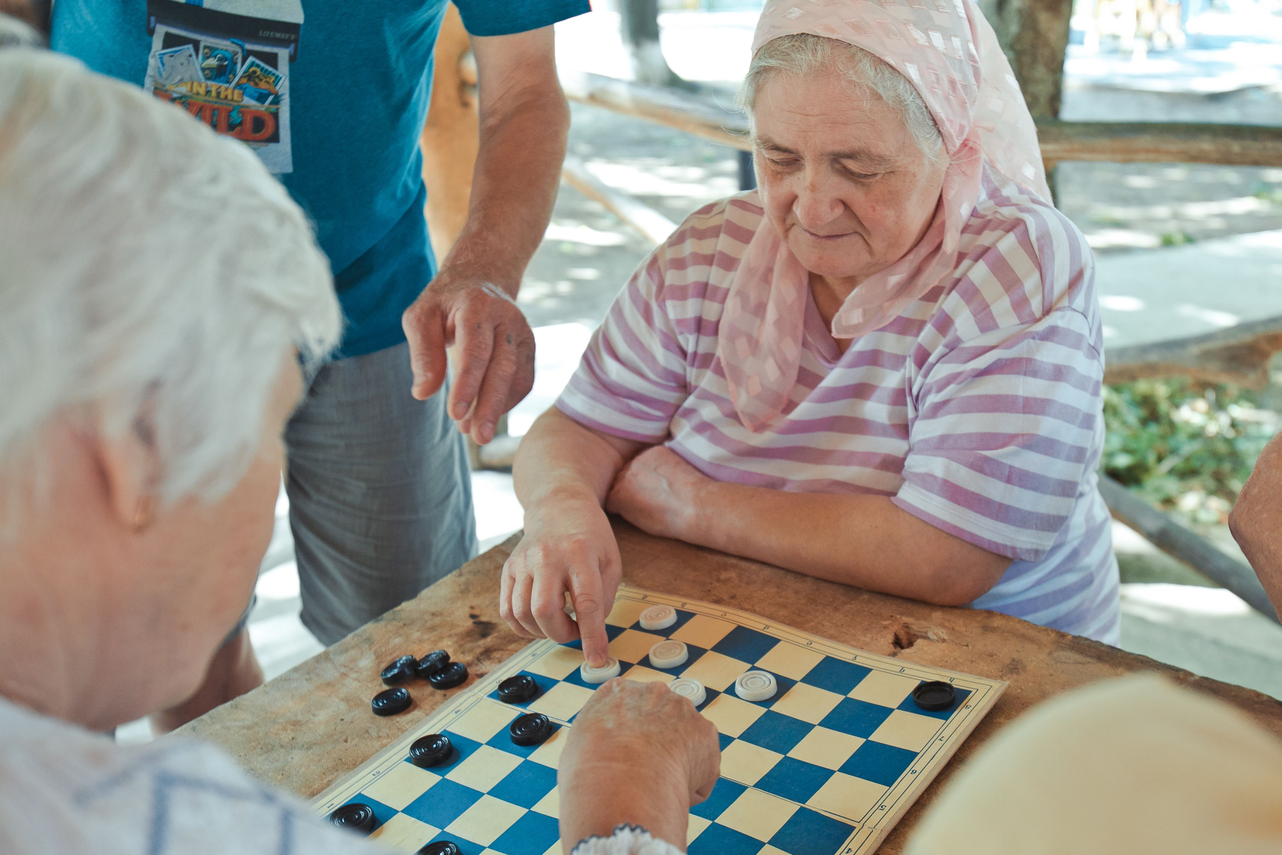 walking camels in line during daytime