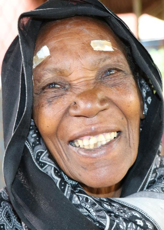 a man with a mask and horns on his head