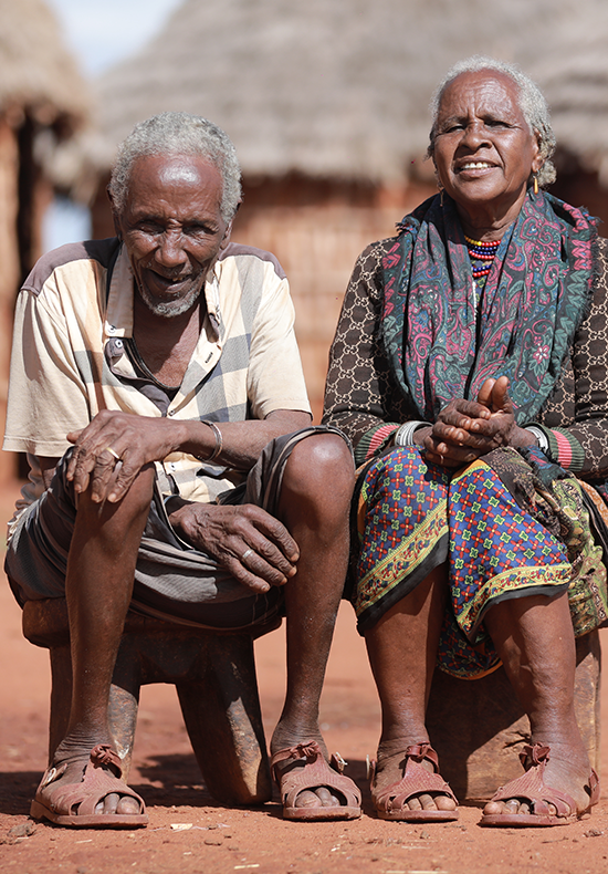 a man with a mask and horns on his head